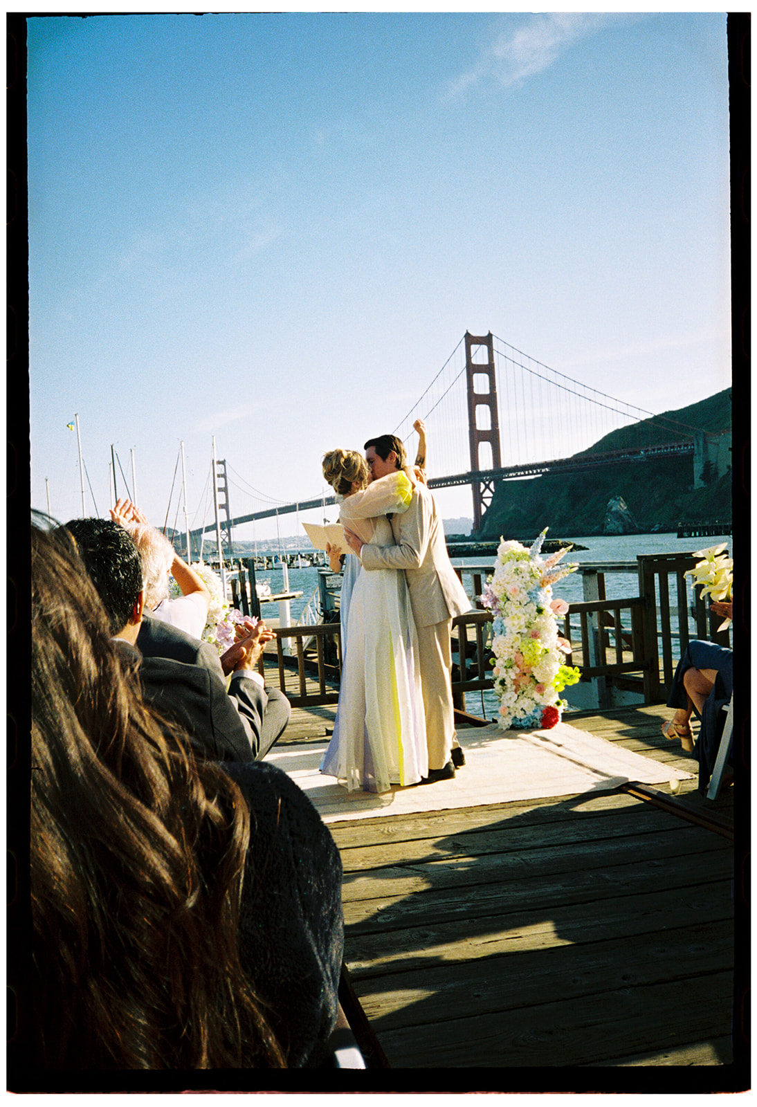 travis marina wedding with couple embracing