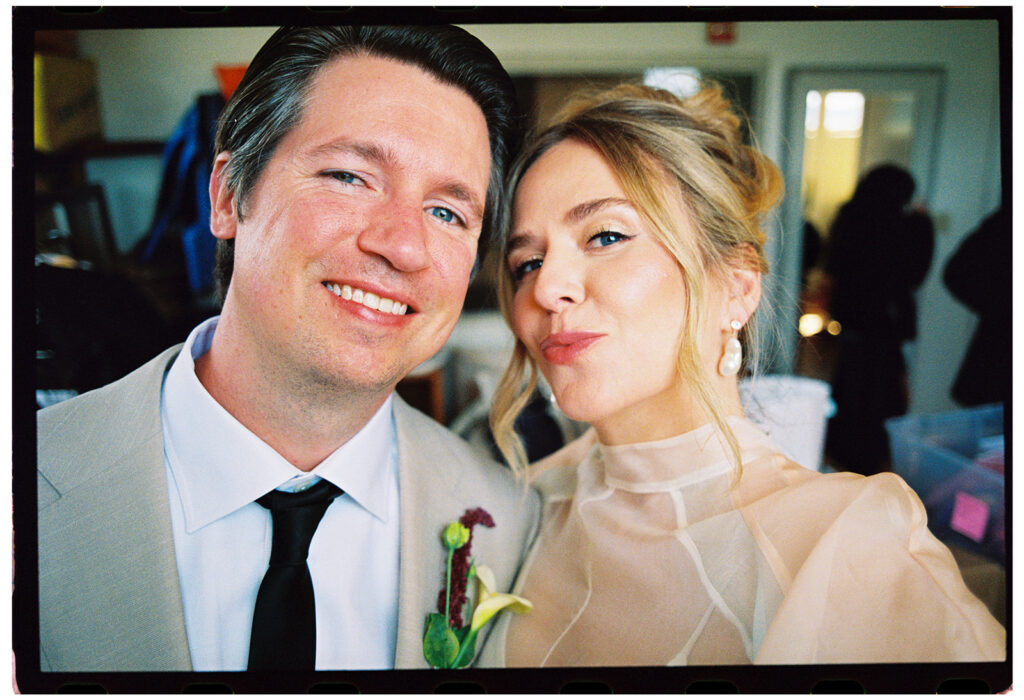 bride and groom selfie at wedding reception san francisco