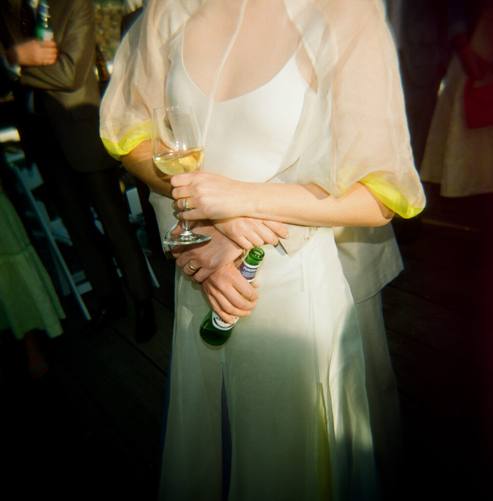 bride with drinks at travis marina wedding