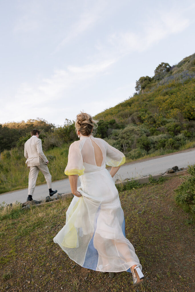 bride running to groom at san francisco wedding at travis marina