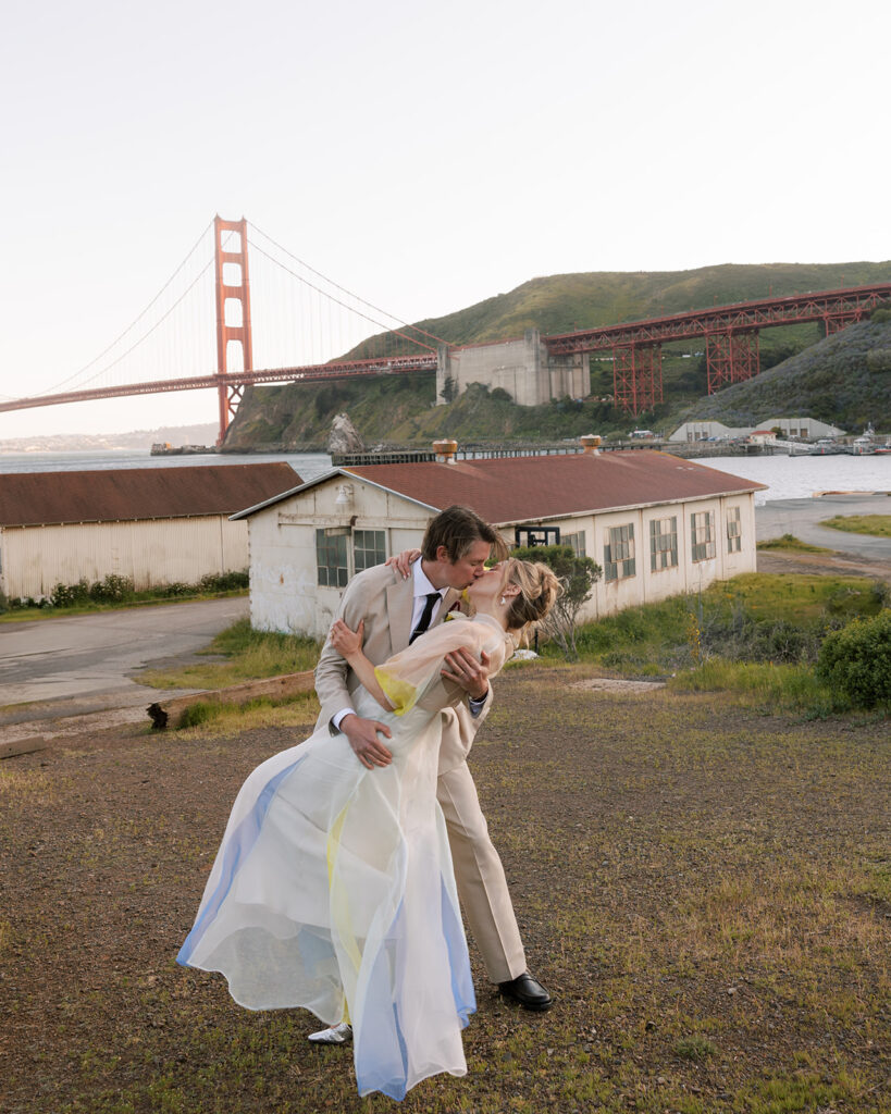 bride and groom kissing at san francisco wedding at travis marina