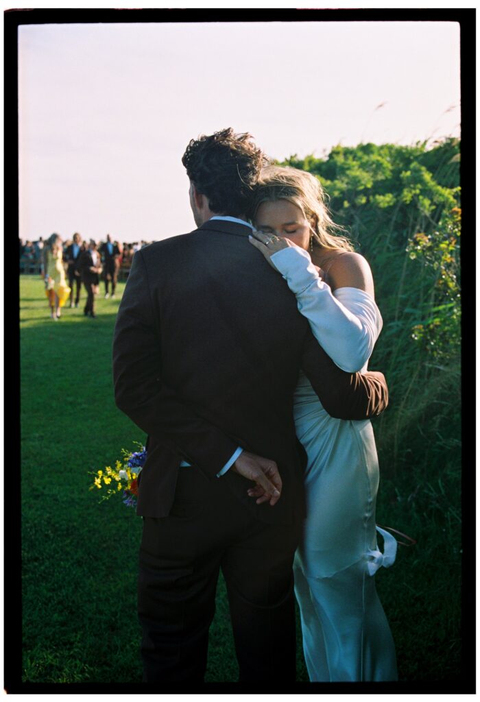 bride and groom embracing to show whalehead club events