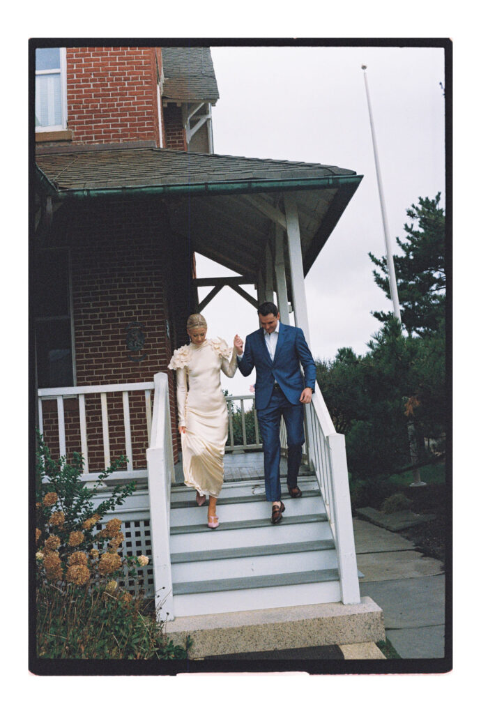 Couple walking out of the parker house for their wedding