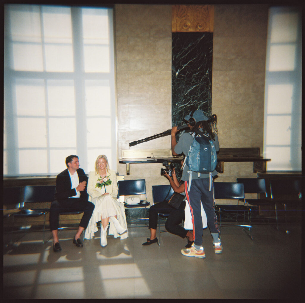 Documentary crew interviewing couple after their NYC elopement
