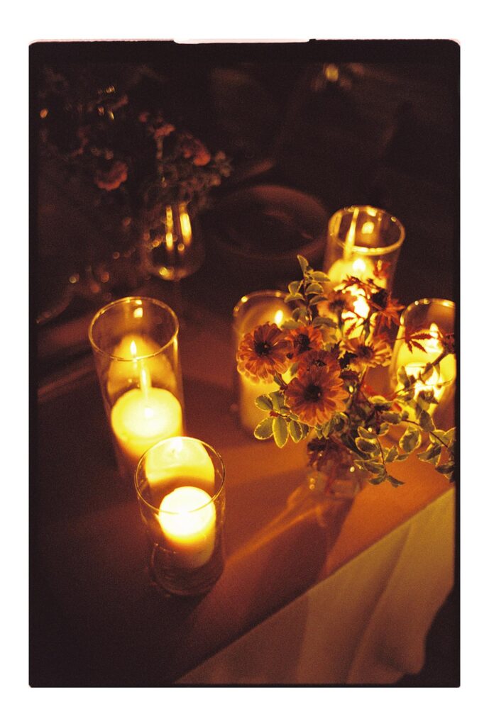 big sur wedding photos of candles and flowers in the evening