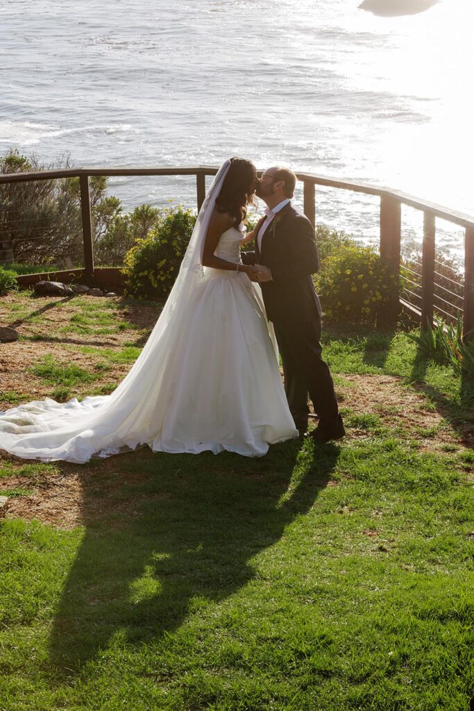 Bride and groom kissing at big sur california wedding