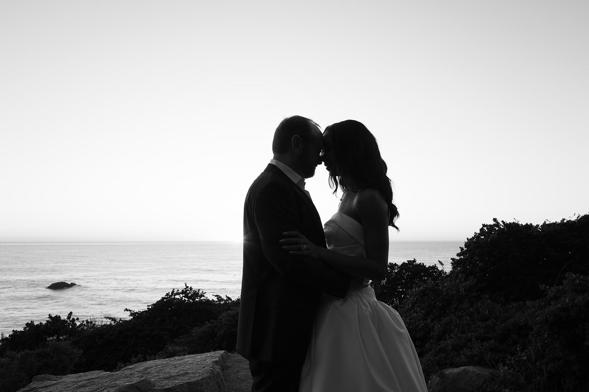 big sur wedding photos with bride and groom in front of ocean
