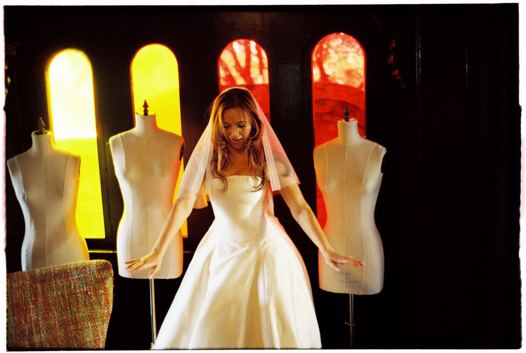 bride getting ready with mood lighting, taken at hotel st vincent before ceremony at st mary's new orleans church