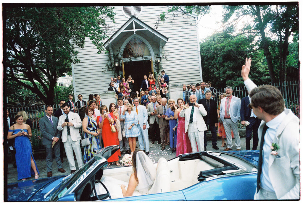 new orleans wedding pictures of send off in a vintage car